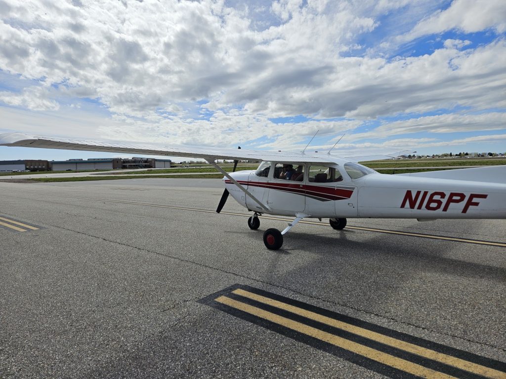 Axiom Aviation Cessna training aircraft on the ramp – Best Time Building Programs for Pilots