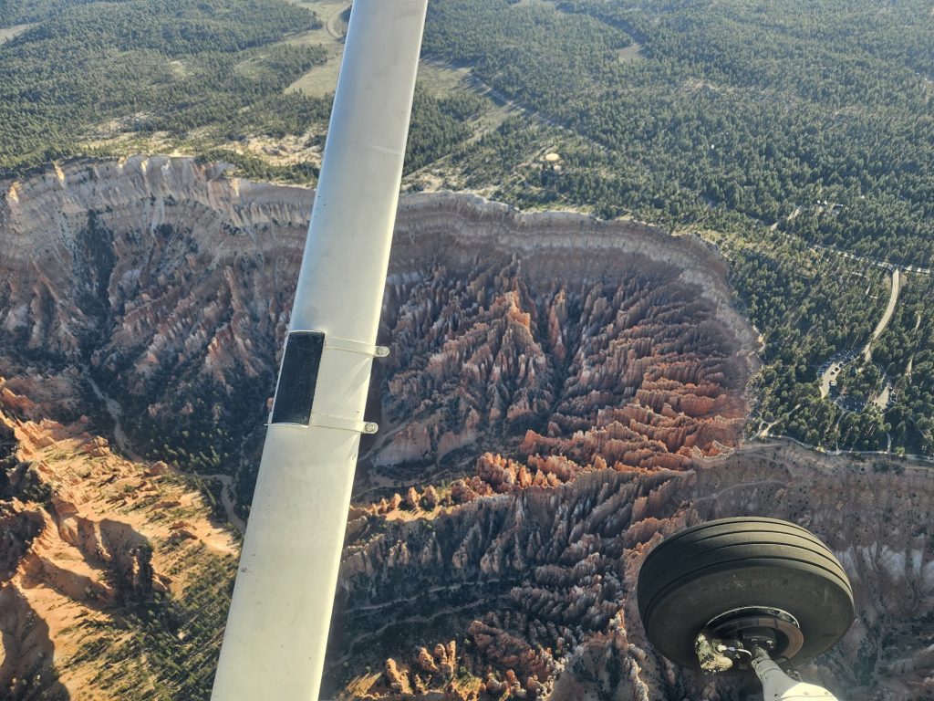 Aerial view of Utah mountains and canyons from an Axiom Aviation Cessna – How Much Do Airline Pilots Make? 2026 Pay Guide