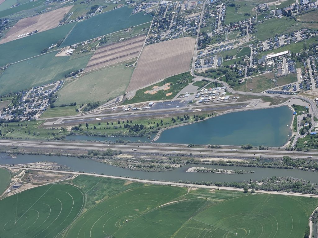 Aerial view of the valley below from an Axiom Aviation Cessna – Best Aviation Headset Reviews for Pilots