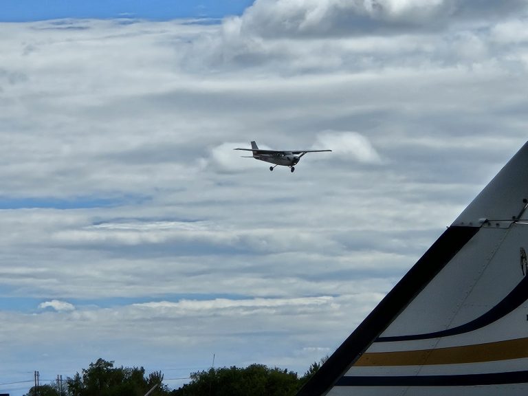 Axiom Aviation Cessna in flight – How Much Does It Cost to Become a Pilot?