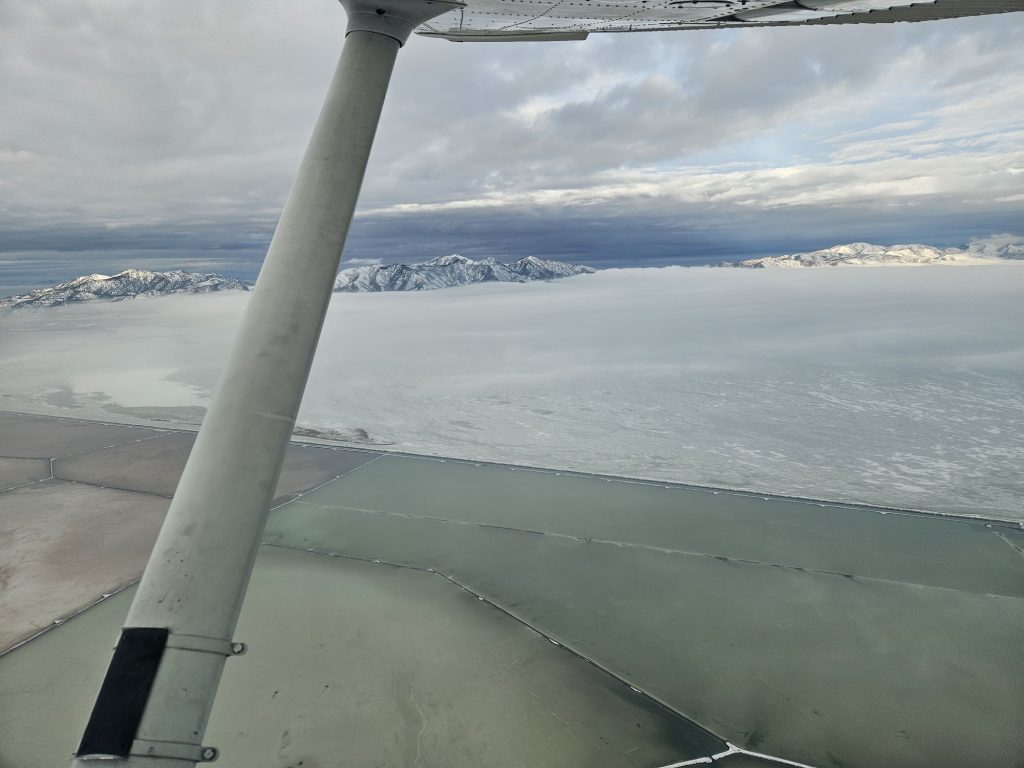 Aerial view of a lake during an Axiom Aviation training flight – Cross Country Flight Planning