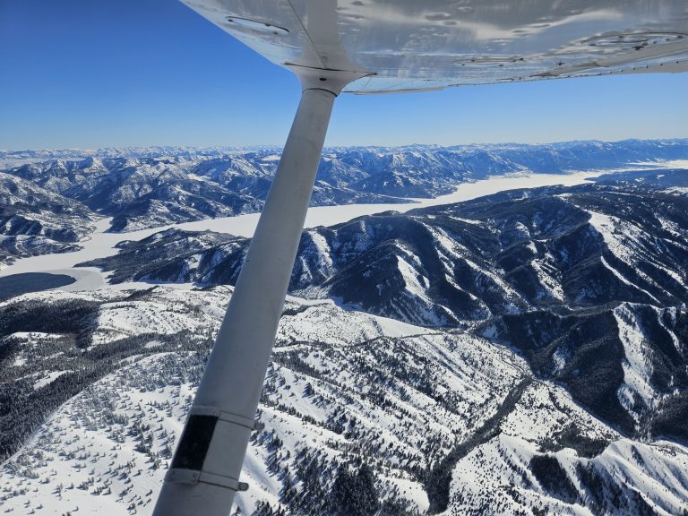 Aerial view of snow-covered Utah mountains from an Axiom Aviation training aircraft – Veteran Flight Training